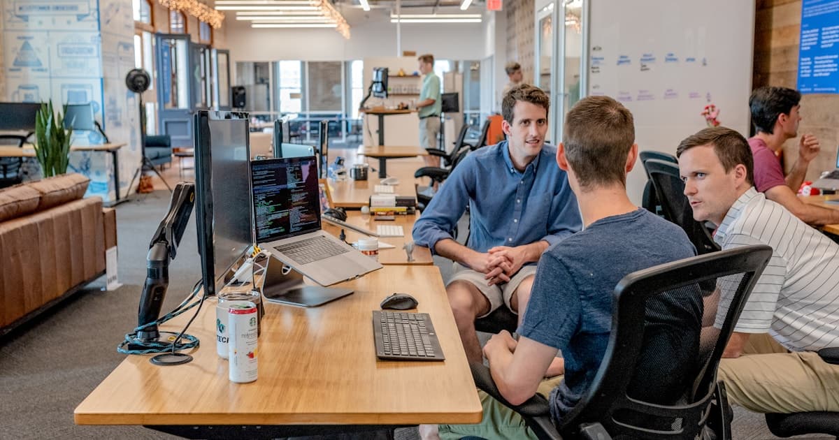 Business team comparing project options in a meeting
