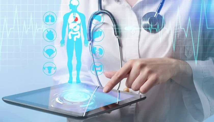 Doctor using a digital health record on a tablet